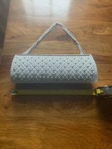 White beaded clutch bag