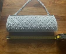 White beaded clutch bag