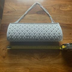 White beaded clutch bag