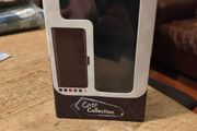 Black Multi functional phone case.  New in box.