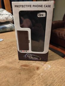 Black Multi functional phone case.  New in box.