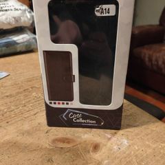 Black Multi functional phone case.  New in box.