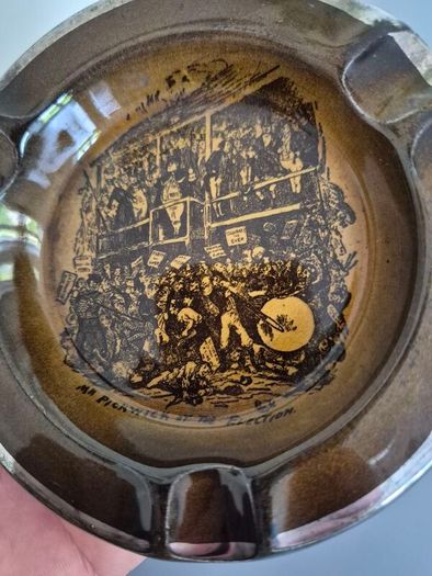 vintage ceramic ashtray featuring a scene titled "Mr Pickwick at the Election" from the Charles Dickens novel The Pickwick Papers