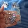 Bundle x 8 Olivia Rodrigo You Seem Pretty Sad For A Girl So In Love Keyrings. Available Separately. Image 5