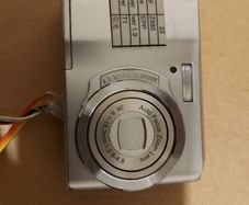 Z880 Digital Camera, Takes 2AA Batteries, working fine, has a modification that doesn't affect its performance