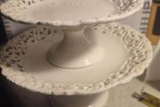 Vintage pedestal cake stand set of 2 one large the anther one is smaller.