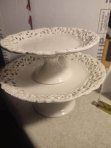 Vintage pedestal cake stand set of 2 one large the anther one is smaller.
