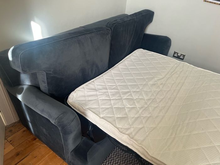 Made.com Orson 3 seater sofa-bed in midnight blue velvet
