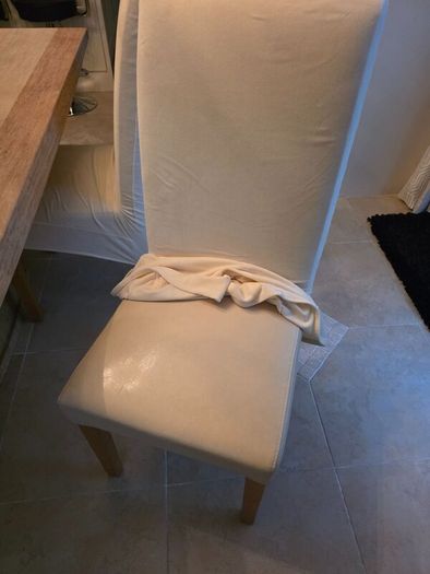 Marble table with 4 cream leather chairs