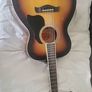 acoustic guitar and tuner Image 2