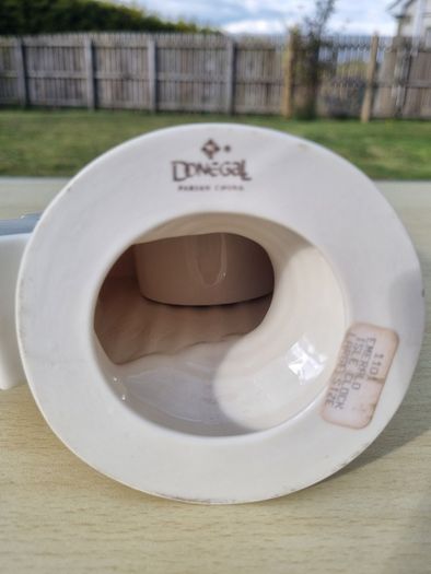 Donegal Parian China, an Irish mantel clock in the shape of a map of Ireland