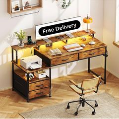 135cm Computer Desk with Power Outlet and Charging Station, Reversible Home Office Desk with Fabric Drawers and Monitor Stand, Wooden Desks with Storage, Study Table, Rustic Brown