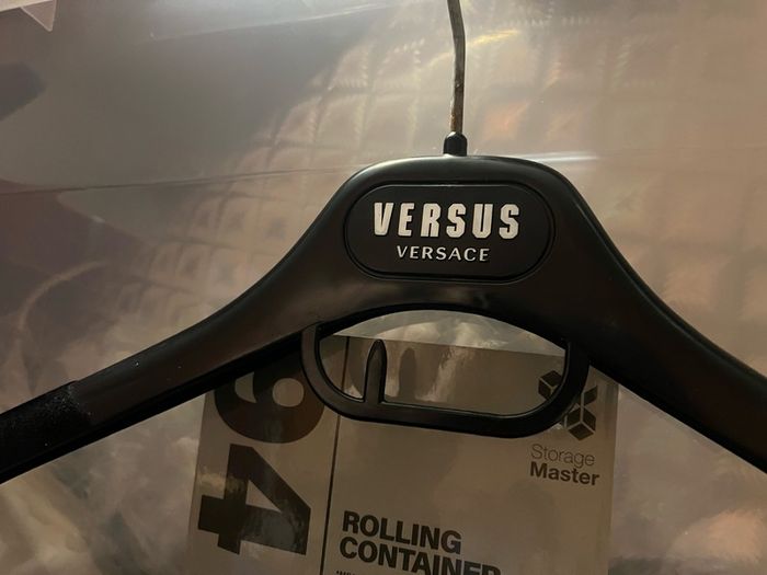 Armani Versace Hugo Boss clothes coat trousers Hangers