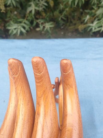 Buddha hand hardwood wine holder