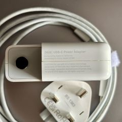 Apple 96 watt USB-C power adapter new plug and cable included.