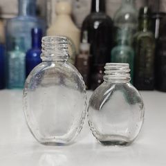 422 - Set of 2 Vintage Small Tabloid Collectible Decorative Bottles