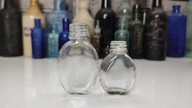 422 - Set of 2 Vintage Small Tabloid Collectible Decorative Bottles