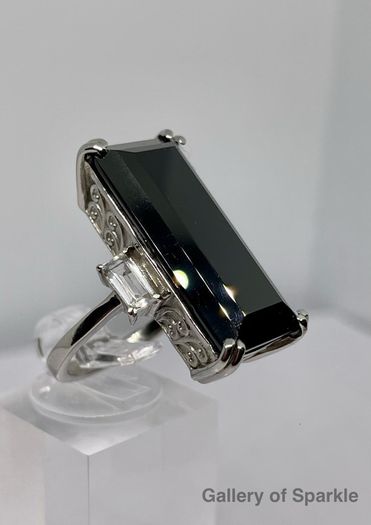 Black Spinel and White Topaz.