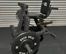 Leg Curl and Extension machine. Plate loaded