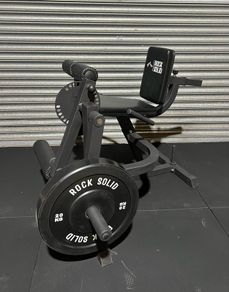 Leg Curl and Extension machine. Plate loaded