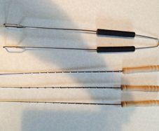 Kitchen Tongs & 3 Skewers (brand New).