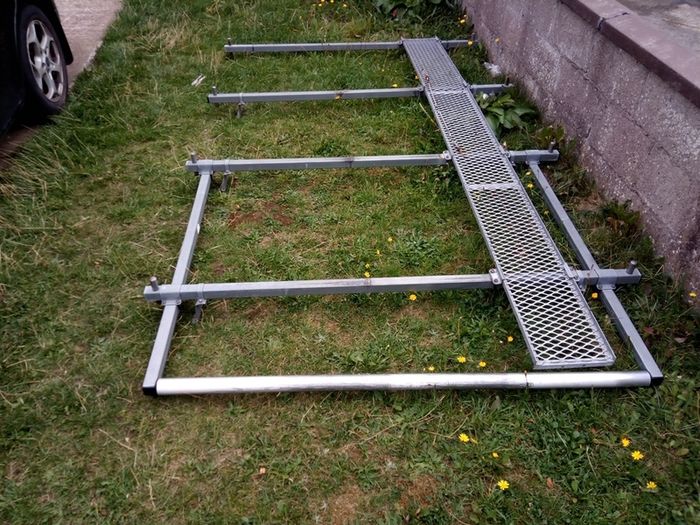 van roof rack for vivaro trafic primastar 3 years old great condition has a ladder roll bar on back for easy putting or taking off of ladders and tie cage on top of it too