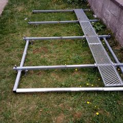 van roof rack for vivaro trafic primastar 3 years old great condition has a ladder roll bar on back for easy putting or taking off of ladders and tie cage on top of it too