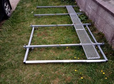 van roof rack for vivaro trafic primastar 3 years old great condition has a ladder roll bar on back for easy putting or taking off of ladders and tie cage on top of it too