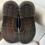 Black Doc Martin shoes. Image 2
