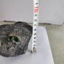 Face rock with green eyes hand carved Image 4
