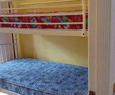 white metal bunk beds