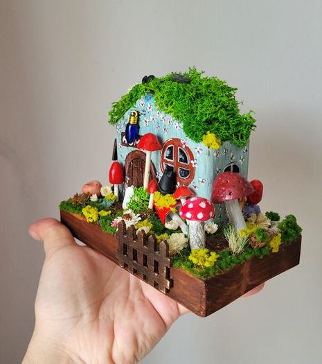 handcrafted fairy cottage with moss roof!