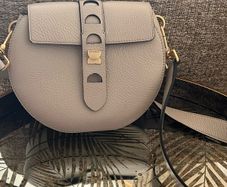 Coccinelle saddle bag . Great condition