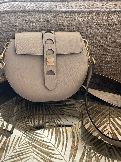 Coccinelle saddle bag . Great condition