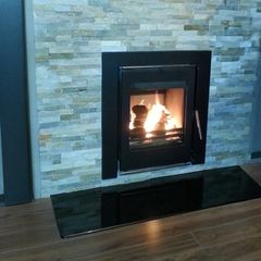 Insert/cassette stove for fireplace