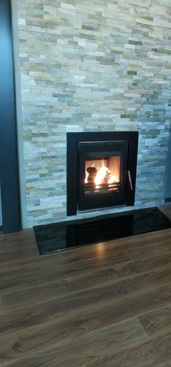 Insert/cassette stove for fireplace