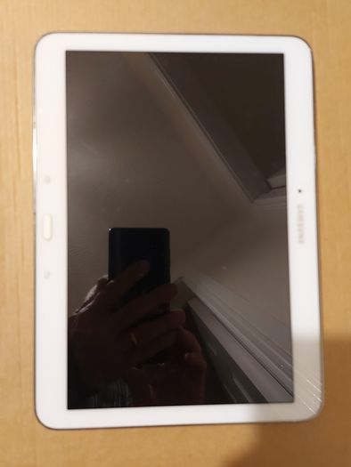 Samsung Galaxy Tab 4, Model SM-T530, 16GB, White, working great, in excellent condition and with a bunch of Family-children  movies