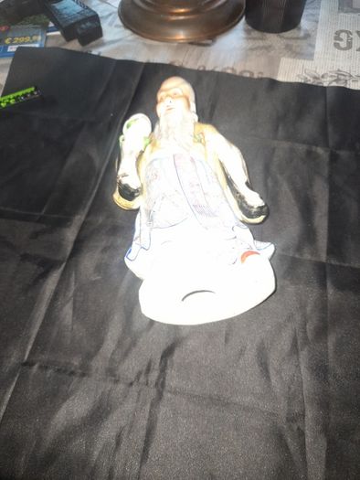 Beautiful Large Chinese Shou Xing porcelain figurine depicting the God of Longevity. It features an elderly man with a prominent bald head, holding a peach, which symbolizes long life, Postage Available, no chips or cracks