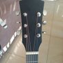 Black acoustic guitar Image 3