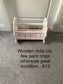 Wooden dolls cot