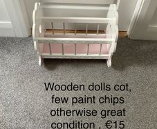 Wooden dolls cot