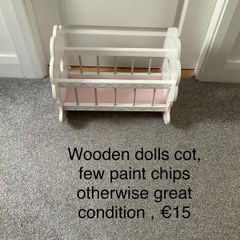 Wooden dolls cot