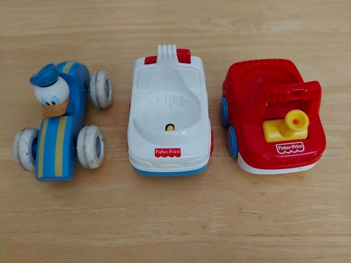 Vintage Fisher Price and Brio Donald Duck Car.