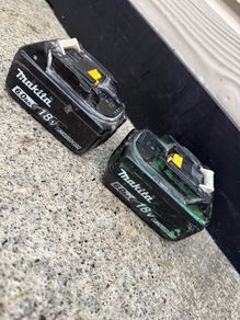 2  genuine Makita 18V 6.0Ah Li-Ion batteries.