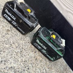 2  genuine Makita 18V 6.0Ah Li-Ion batteries.