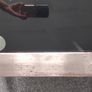 Glass black coffee table with silver legs Image 4