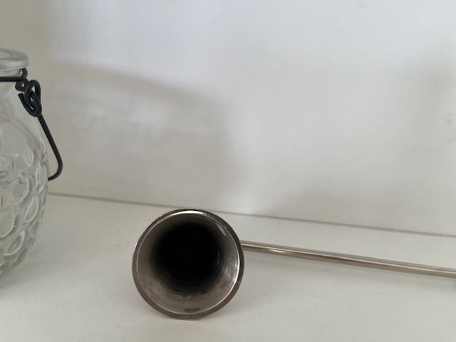 Metal Handle Candle Snuffer. Silver Finish. Moveable Head. With Hanging Tea Light. In Excellent Condition.