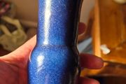 A blue glazed ceramic vase