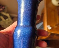 A blue glazed ceramic vase