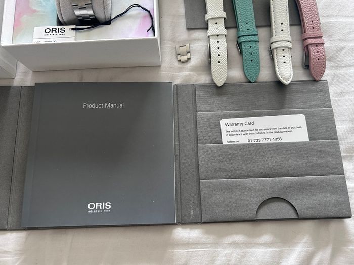Oris Diver 65 cotton candy pink dial watch